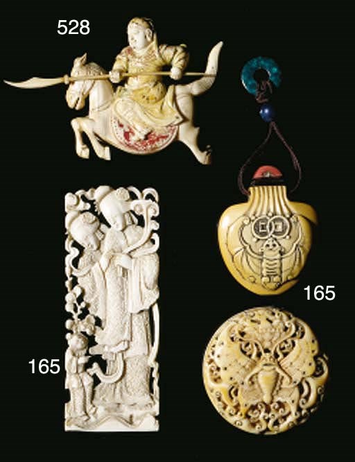 An ivory carved ivory plaque