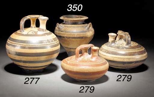 A MYCENAEAN PAINTED POTTERY STIRRUP JAR