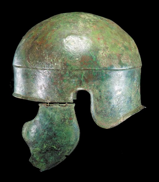 A GREEK BRONZE HELMET