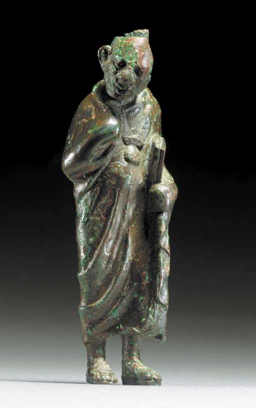 A HELLENISTIC BRONZE FIGURE OF A SCHOOL MASTER