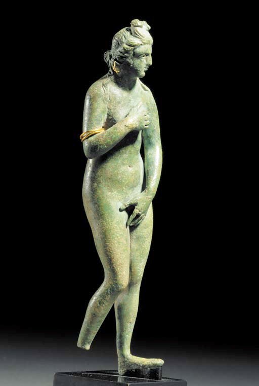 A ROMAN BRONZE FIGURE OF APHRODITE
