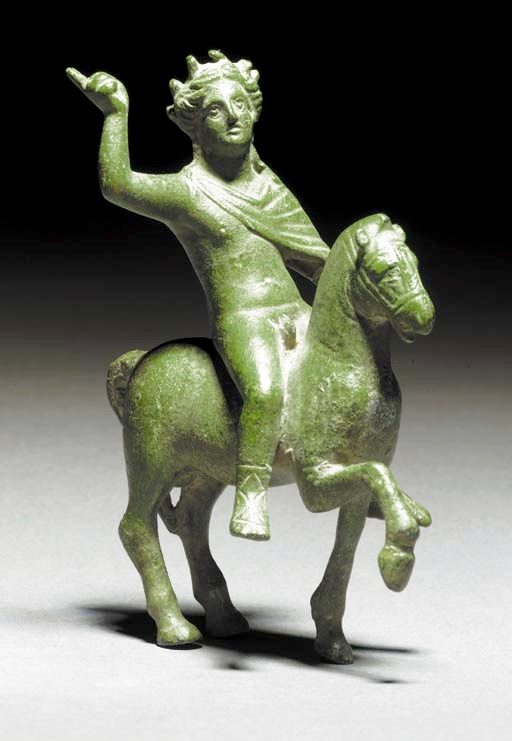 A ROMAN BRONZE FIGURE OF APOLLO ON HORSEBACK