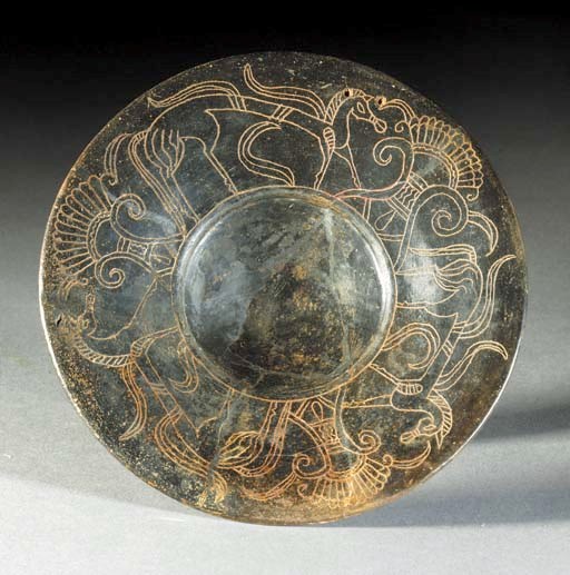 A FALISCAN OR CAPENAN IMPASTO WARE FOOTED DISH