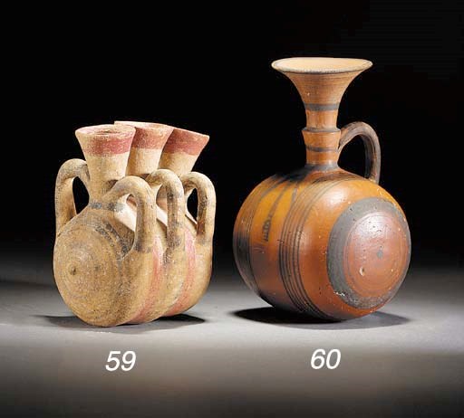 A CYPRIOT BICHROME WARE TRIPLE-BODIED FLASK