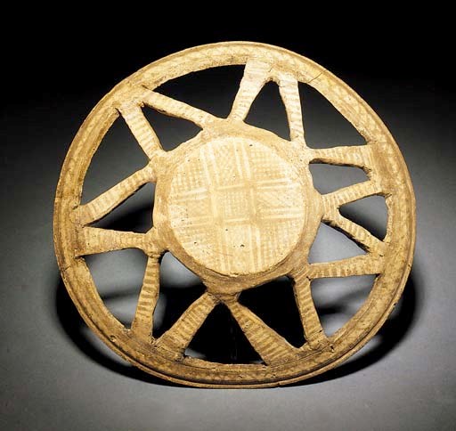 A CYPRIOT WHEELMADE WHITE PAINTED WARE OPEN-WORK BASKET