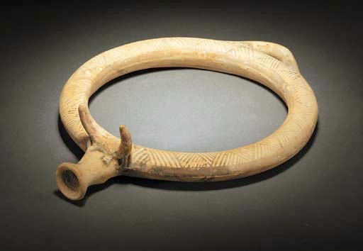 A CYPRIOT WHEELMADE WHITE PAINTED WARE ZOOMORPHIC-SPOUTED RING VESSEL