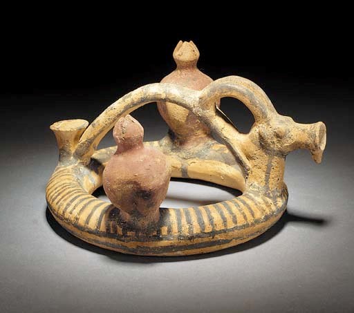 A CYPRIOT BICHROME WARE ZOOMORPHIC-SPOUTED RING VESSEL