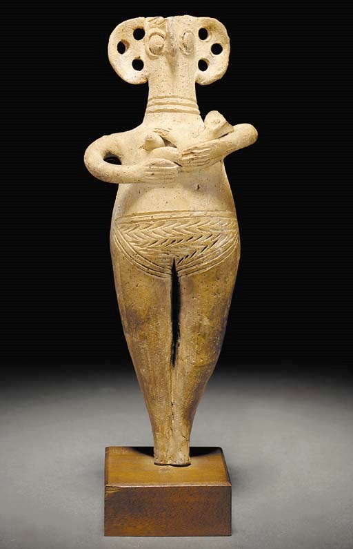 A CYPRIOT BASE RING WARE MOTHER AND CHILD