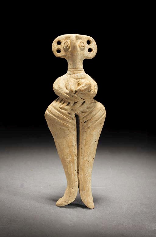 A CYPRIOT BASE RING WARE FEMALE FIGURE