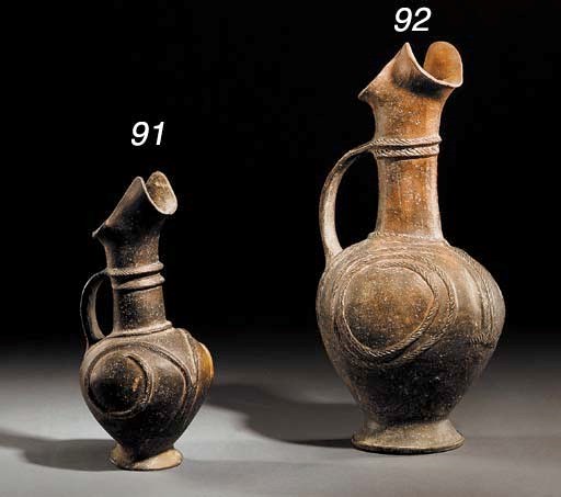A CYPRIOT BASE RING WARE JUG