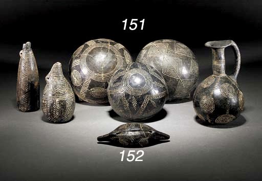 EIGHT CYPRIOT BLACK POLISHED WARE VESSELS WITH INCISED DECORATION