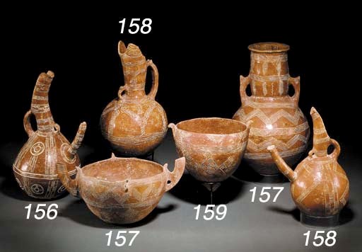 A CYPRIOT INCISED RED POLISHED WARE JAR AND BOWL