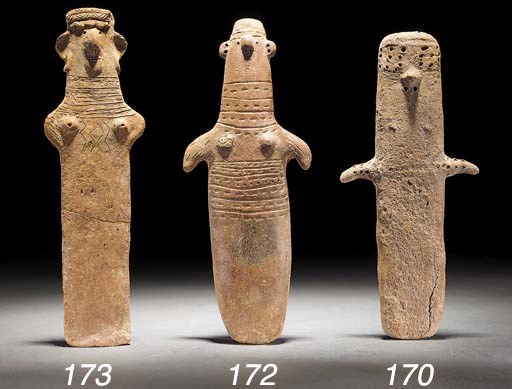 A CYPRIOT INCISED RED POLISHED WARE FEMALE PLANK FIGURE