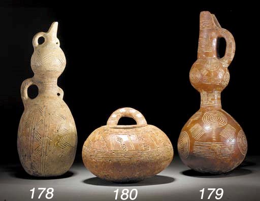 TWO CYPRIOT INCISED RED POLISHED WARE COMPOSITE JUGS