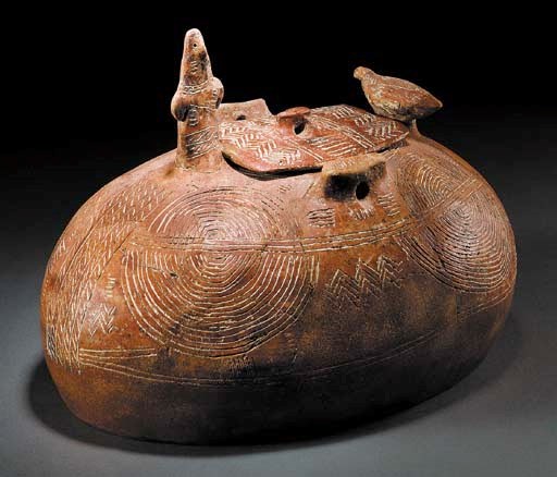 A CYPRIOT INCISED RED POLISHED WARE PYXIS