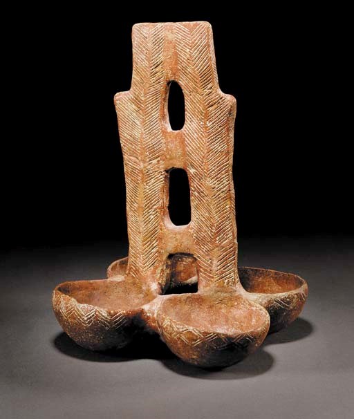 A CYPRIOT INCISED RED POLISHED WARE FOUR-BOWL VESSEL