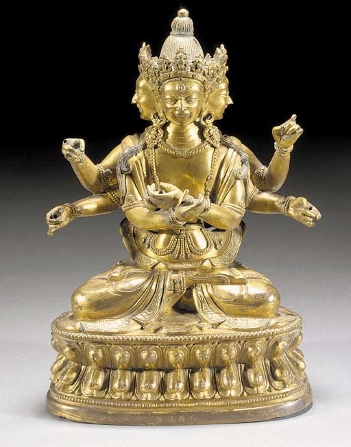 A Sino-Tibetan gilt bronze multi-headed figure
Qianlong four character mark and of the period