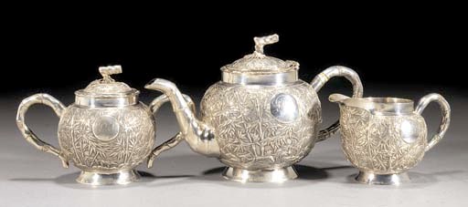 A silver three piece tea set
19th Century