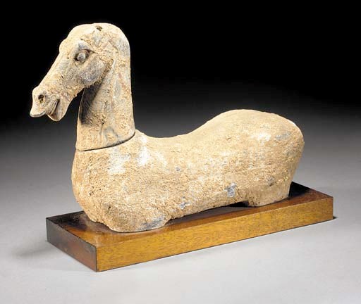 A painted wood model of a horse
Han Dynasty