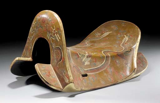 A lacquered wood saddle
19th Century