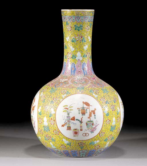 A famille rose yellow ground bottle vase
Late 19th Century