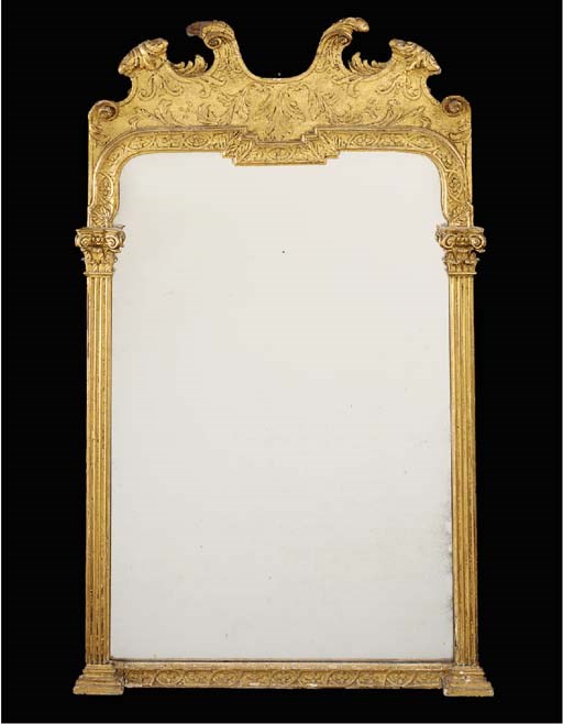 A GILTWOOD AND GESSO WALL MIRROR, INCORPORATING EARLY 18TH CENTURY ELEMENTS