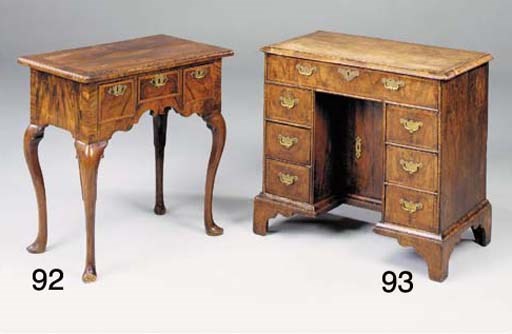 A WALNUT, CROSSBANDED AND FEATHERSTRUNG LOWBOY, EARLY 18TH CENTURY AND LATER