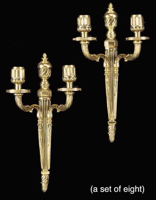 A set of eight gilt-bronze twin light wall appliques, 20th century