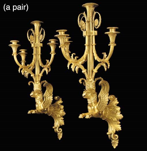 A pair of Empire style four light wall appliques, of recent manufacture