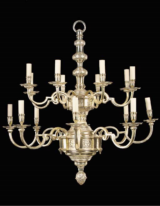 A Regence style silvered bronze sixteen light chandelier, 20th century