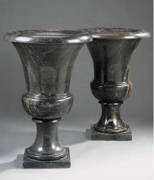 A pair of variegated black marble campana urns, 20th century