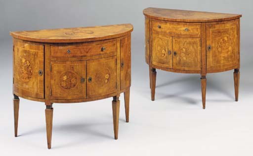 A PAIR OF ITALIAN WALNUT, TULIPWOOD CROSSBANDED AND MARQUETRY DEMI-LUNE COMMODES, LATE 19TH/EARLY 20TH CENTURY