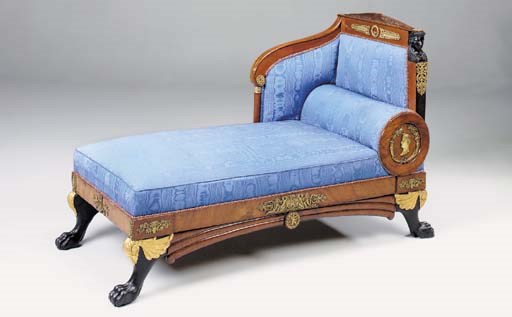A NORTHERN EUROPEAN MAHOGANY EBONISED PARCEL GILT ORMOLU MOUNTED CHAISE LONGUE, EARLY 19TH CENTURY, PROBABLY RUSSIAN, in the Empire style
