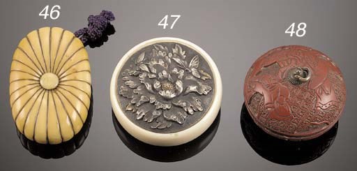 An ivory and silver kagamibuta
19th Century