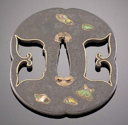 An iron enamel inlaid tsuba
Hirata school 18th Century