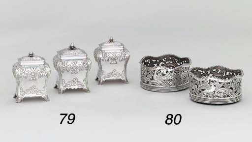 A pair of George III silver tea-caddies and matching sugar-box
