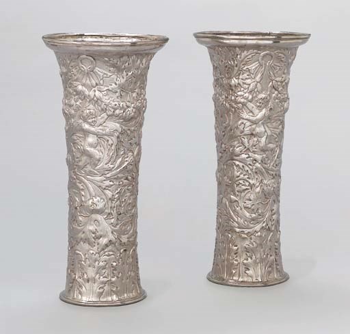 A pair of Charles II silver vases