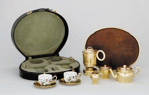 A French silver-gilt and porcelain travelling tea-service