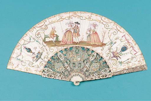 A fine fan, the leaf painted with an elegant couple strolling past a young man reading, and a lady holding a fan, with a young girl holding a bird, the reserves with doves and trophies of music, the verso with garlands of flowers and flambeaux, the ivory sticks carved, pierced and gilt with shepherds and sheep, and possibly with a monogram D.O.- 11in. (27cm.), probably German, circa 1785 - in glazed fan-shaped case