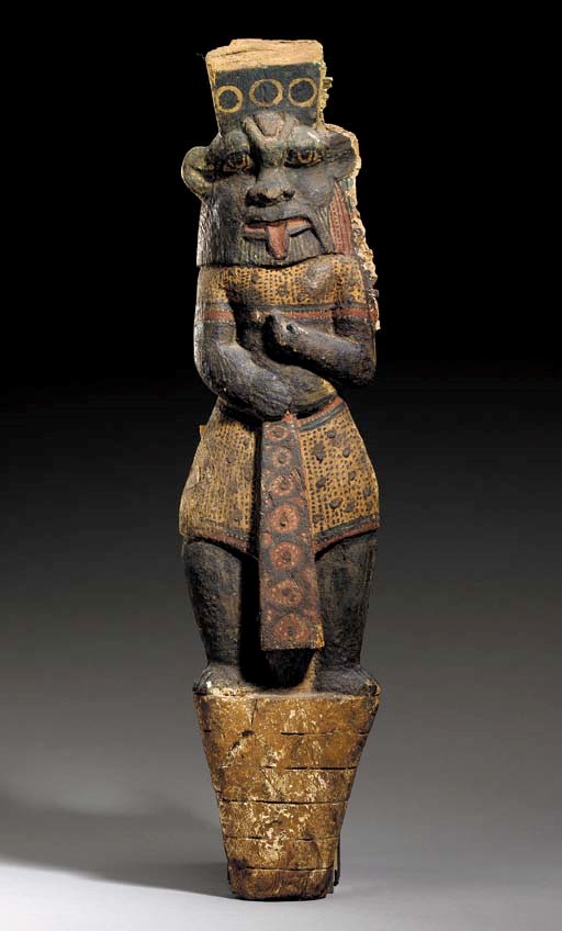 AN EGYPTIAN PAINTED WOOD FURNITURE SUPPORT
