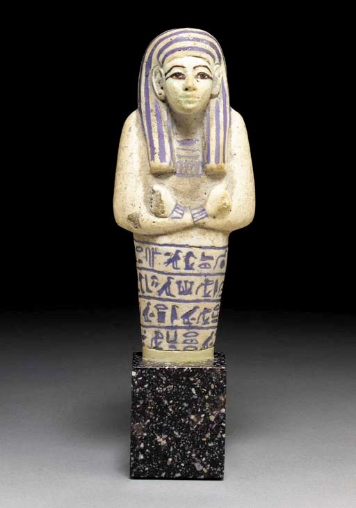 AN EGYPTIAN INLAID FAIENCE SHABTI FOR TA-WESERET