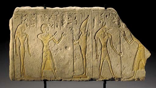 AN EGYPTIAN LIMESTONE RELIEF