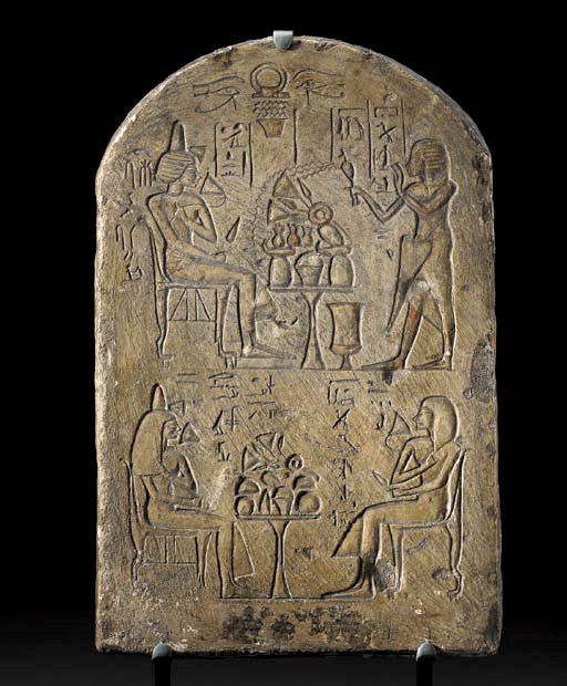 AN EGYPTIAN LIMESTONE STELE