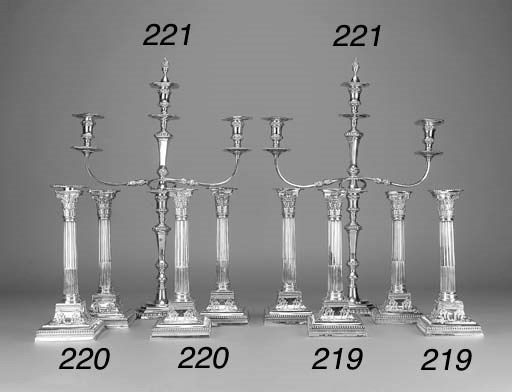 FOUR SIMILAR VICTORIAN AND EDWARDIAN SILVER CANDLESTICKS