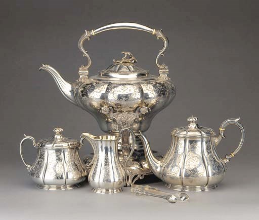 A FIVE-PIECE VICTORIAN SILVER TEA SERVICE