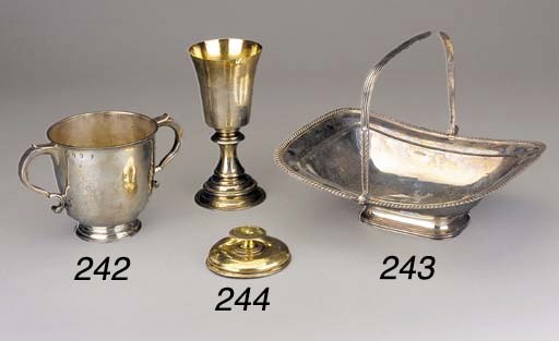 AN ELIZABETH I SILVER-GILT PATEN AND AN ASSOCIATED COMMUNION CUP