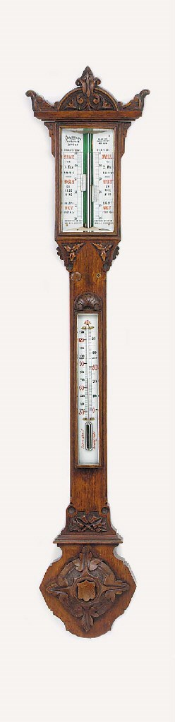A Victorian carved oak stick barometer, last quarter 19th century
