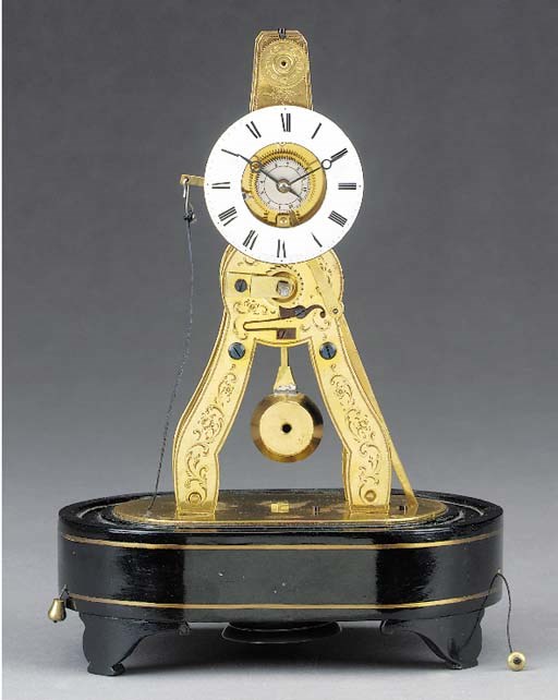 A French Exhibition brass skeleton timepice with alarm, mid 19th century