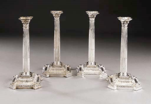 Interessante serie di quattro candelieri in argento, Londra