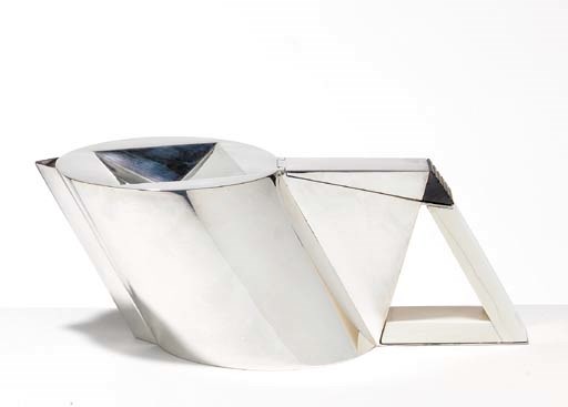 A SILVER AND IVORY TEAPOT**